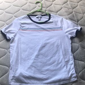 shirt that has a rainbow across it